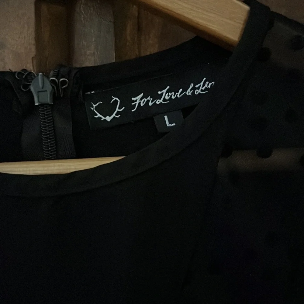 For Love and Lemons black cut off bottom flared sleeve blouse